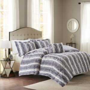 Snuggle up for a luxurious sleep with the Madison Park Zuri Comforter Set. This set features an ultra-soft faux fur front