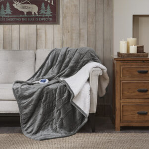 Immerse yourself in comfort in the Woolrich Heated plush to berber throw. This heated throw utilizes state of the art Secure Comfort heated technology featuring 3 heat settings that adjusts the temperature of your blanket based on overall temperature