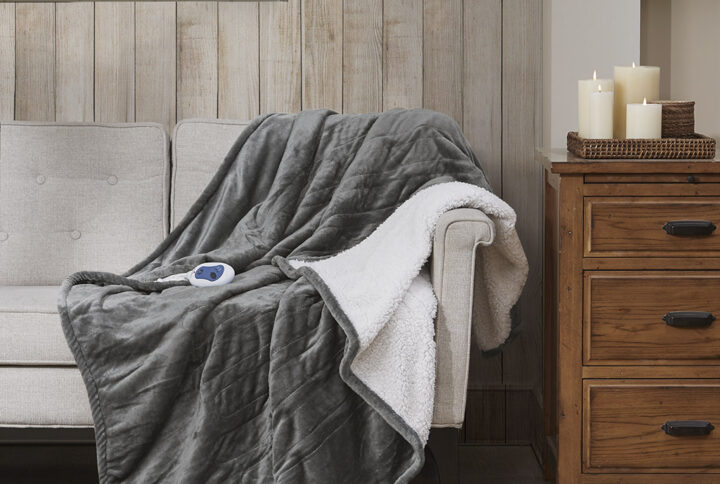 Immerse yourself in comfort in the Woolrich Heated plush to berber throw. This heated throw utilizes state of the art Secure Comfort heated technology featuring 3 heat settings that adjusts the temperature of your blanket based on overall temperature