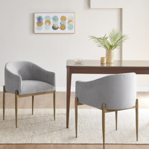 Bring glamorous style to your dining room with the Madison Park Sheraton Dining Chair Set of 2. Each dining chair is upholstered in a soft grey fabric with tufted buttons around the arms and low back to create a luxurious modern look. The metal legs flaunt a distressed gold finish to complement the upholstery and give the chair an upscale