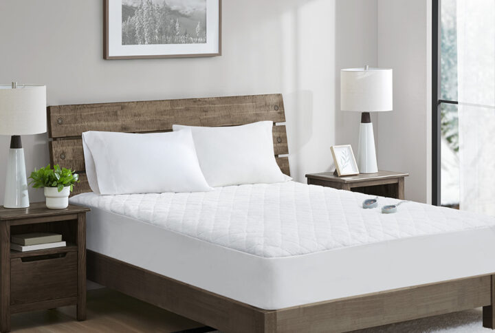 Reduce your energy bills while being comforted by the warmth of the Woolrich Heated Sherpa mattress pad. The cozy sherpa material provides a soft base