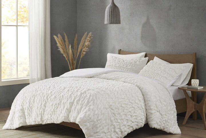 Add glamorous style and comfort to your bedroom with the Madison Park Blair Down Alt Ruched Faux Fur Comforter Set. This stylish comforter will liven up your bedroom with its unique texture and beauty. The face features a luxuriously soft faux fur with a stunning ruched design and a solid microfiber reverse. This bedding set includes 1 hypoallergenic polyester filled comforter and 2 shams to complete the look. This comforter set is also OEKO-TEX certified