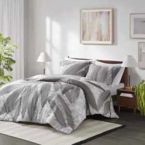 Bring a touch of nature and elegance to your bedroom with this stunning botanical duvet cover set. The duvet cover features a large scale botanical design in shades of gray that contrasts beautifully with a smaller scale botanical print in white