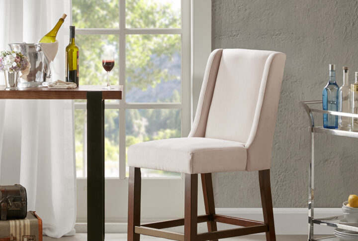 Have your dearest friend over for drinks and enjoy conversation as you both relax in this classic parson counter stool. Assembly required.