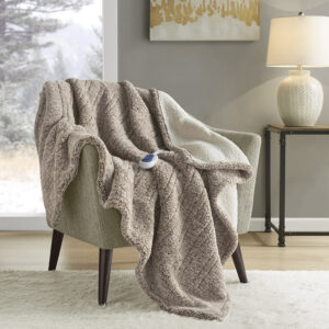 Combine fashion and function seamlessly with this heated throw that will keep you warm and cozy during chilly nights. The sherpa material features a variegated color pattern on front for added style and reverses to a solid sherpa. Three heat settings allow you to easily customize your comfort level to perfection