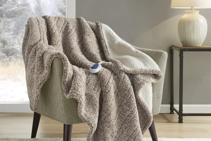 Combine fashion and function seamlessly with this heated throw that will keep you warm and cozy during chilly nights. The sherpa material features a variegated color pattern on front for added style and reverses to a solid sherpa. Three heat settings allow you to easily customize your comfort level to perfection