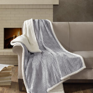 This super soft plush throw features a textured design that adds dimension to the throw. The reverse features a cozy berber to keep you warm. It's also oversized for added warmth and comfort.