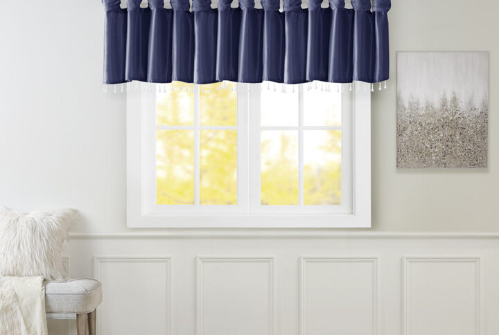 Give your home a decorator’s touch with the Madison Park Emilia Window Valance. Made from a faux silk fabric