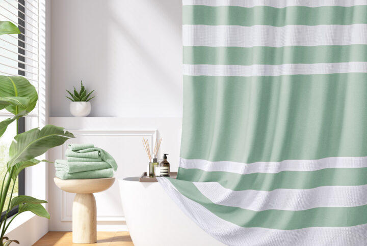 Update your space with the Madison Park Spa Waffle Shower Curtain with 3M Treatment. Featuring a fresh and updated stripe design