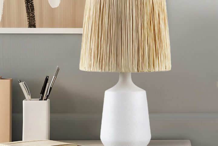 Elevate your home decor with the INK+IVY Ethra Table Lamp. With its contemporary design and modern artisan feel