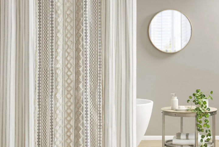 Elevate the look of your bathroom with the INK+IVY Imani Cotton Printed Shower Curtain with Chenille Stripe. This 100% cotton shower curtain features a globally inspired Aztec print with a cotton chenille trim that adds a sophisticated touch. Machine washable for easy care