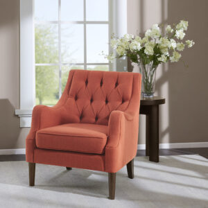 Grace your living room with the Madison Park Qwen Button Tufted Chair. This vintage inspired frame features sweeping serpentine arms and deep button tufting to create a soft diamond accent. The tight back chair is upholstered in a vibrant spice fabric. It is elevated on elegantly tapered solid wood legs in espresso finish. Leg assembly required.