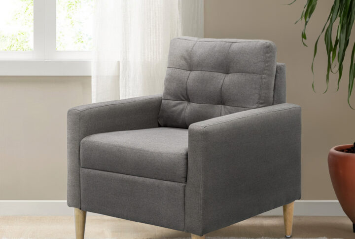 Upgrade your living space with our modern accent chair. With clean lines and a sleek track arm silhouette