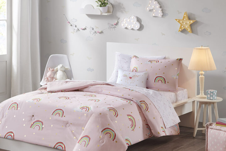 The Mi Zone Kids Alicia comforter features an adorable rainbow and gold metallic star print for a cute and playful look. The comforter and shams (1 in Twin) bring a whimsical charm to your kid's bedroom and a complete sheet set with a fun unicorn print coordinates beautifully with the comforter set