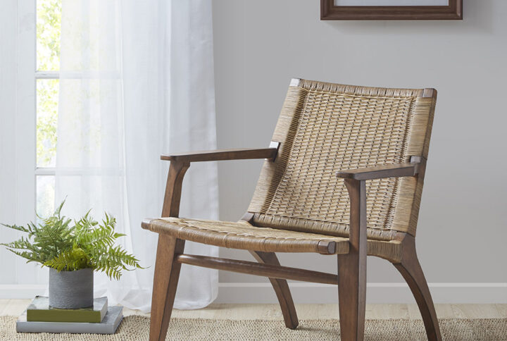 Complete your indoor space with the natural allure of the Madison Park Clearwater Accent Chair. This accent chair features a rattan back and seat with a mahogany wood frame