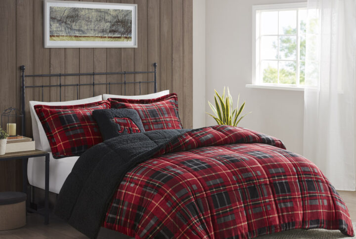 Bring the warmth and comfort of a cabin retreat to your bedroom with the Woolrich Alton Plush to Sherpa Down Alternative Comforter Set. Made from ultra-soft plush and reversing to a cozy berber