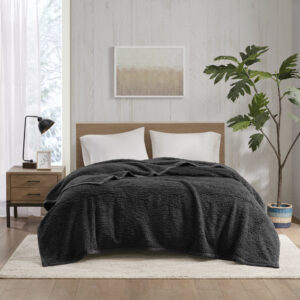 Stay warm through the night with the Woolrich Burlington berber blanket. The cozy soft berber blanket features a rich solid hue with a velvet binding to create a stylish transitional look. Machine washable for easy care