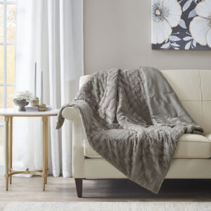 Keep yourself warm and cozy with the Arctic plush throw. The ultra plush fabric is incredibly soft and features a checkboard design for added texture and dimension. This throw is machine washable for easy care and is also OEKO-TEX certified