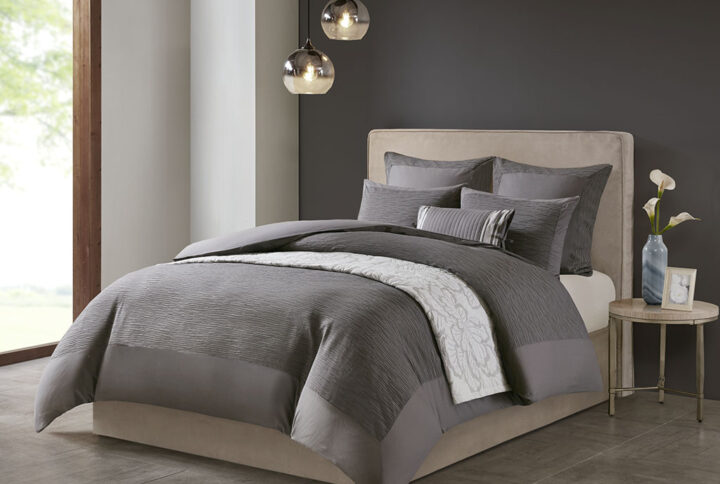 Express your unique style with yarn dyed textural appeal of the N Natori Hanae 3 Piece Duvet Cover Set. The oversized grey duvet cover flaunts a textured fabric that adds dimension to the top of the bed and creates a cottage-inspired allure. Two matching shams feature a textured face with a solid reverse to pair beautifully with the duvet cover