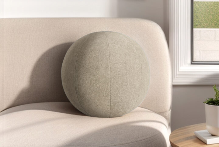 Create an outstanding and exclusive look to your space with the Chapel Hill Round Ball pillow. The 11" round silhouette brings a touch of playfulness and adds an element of unique visual interest. Dressed in a subtle neutral tone with a cozy texture