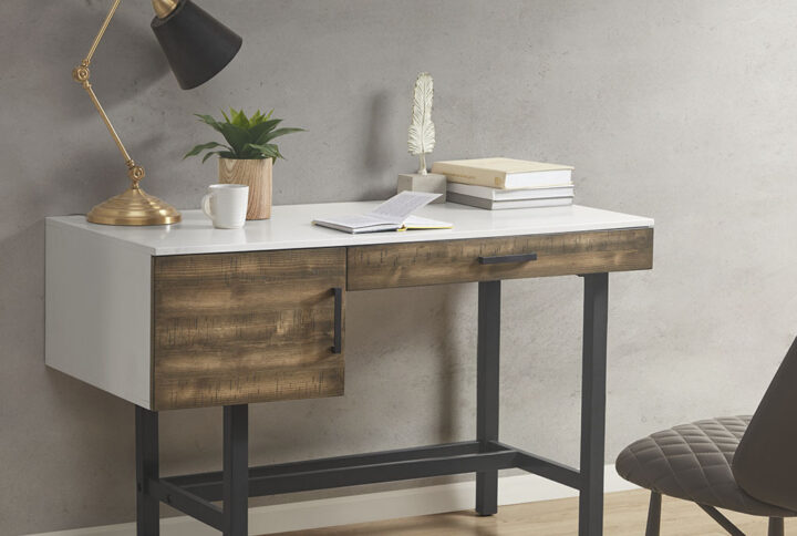 Create the perfect work space in your home office with the Madison Park Kirtley Writing Desk with Drawer. This writing desk features a high gloss white table top with a natural wood grain finish on the front panel to create a chic distressed look. The solid wood legs showcase a matte black metal finish that adds a bold contrasting touch to the design. A single drawer with a black pull bar provides ample space for your writing essentials. With its unique modern charm