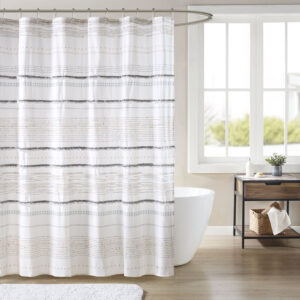 The INK+IVY Nea Cotton Printed Shower Curtain with Trims offers a stunning contemporary update to your bathroom. This 100% cotton shower curtain features tassels and a printed stripe pattern creating a chic boho look. Finished with 12 button holes at the top