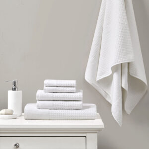 Our Madison Park Spa Waffle Cotton Towel 6 Piece Set provides the perfect textured update to your bathroom decor. This 100% cotton towel set features an all-over waffle combed jacquard design for a rich texture