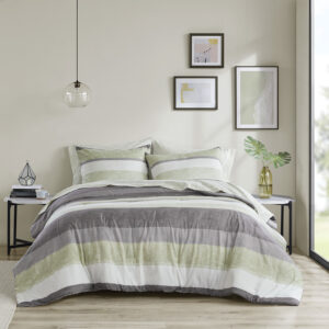 Revamp your bedroom style with the Madison Park Essentials Jaxon bed in a bag. This modern comforter set features a stripe pattern in alternating green