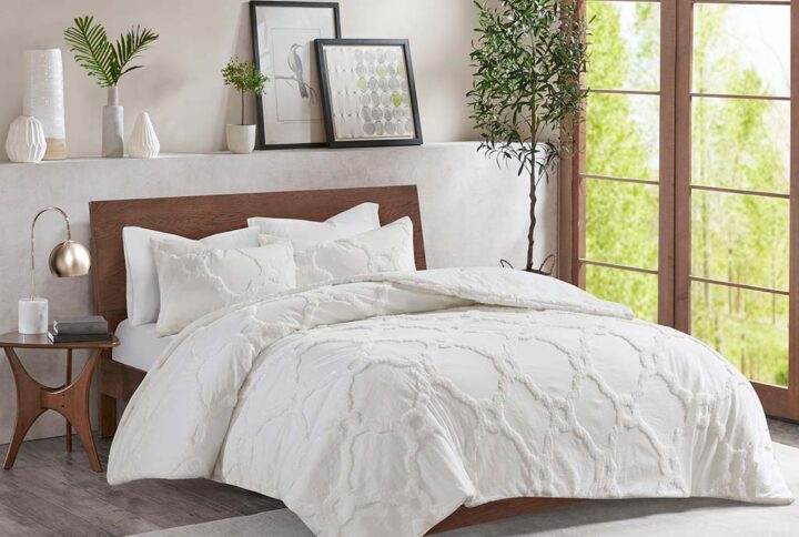 Refresh your bedroom with the Madison Park Pacey 3 Piece Tufted Cotton Chenille Geometric Comforter Set. This 100% cotton comforter features a geometric tufted chenille design that adds a soft texture and dimension to the top of the bed. The 2 matching shams perfectly coordinate with the comforter to create a classic