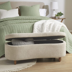 it also has a straight back that fits snugly against a wall or bed. The upholstered bench sits atop solid wood legs