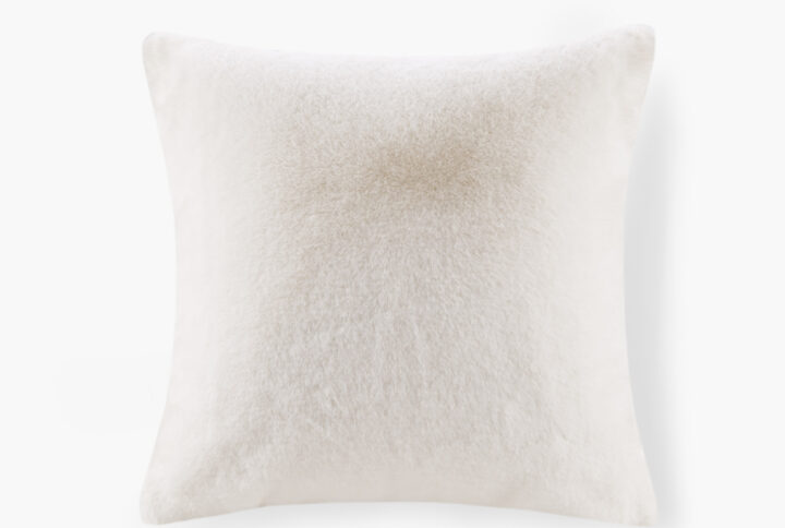 The face of the pillow flaunts a premium luxury faux fur