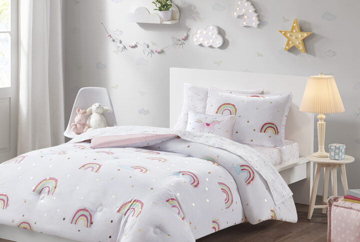 The Mi Zone Kids Alicia comforter features an adorable rainbow and gold metallic star print for a cute and playful look. The comforter and shams (1 in Twin) bring a whimsical charm to your kid's bedroom and a complete sheet set with a fun unicorn print coordinates beautifully with the comforter set