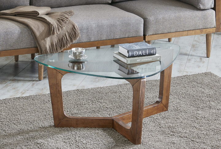 Add a striking mid-century look to your home with the INK+IVY Walker Coffee Table. The solid wood frame displays a warm pecan finish and supports a tempered glass table top