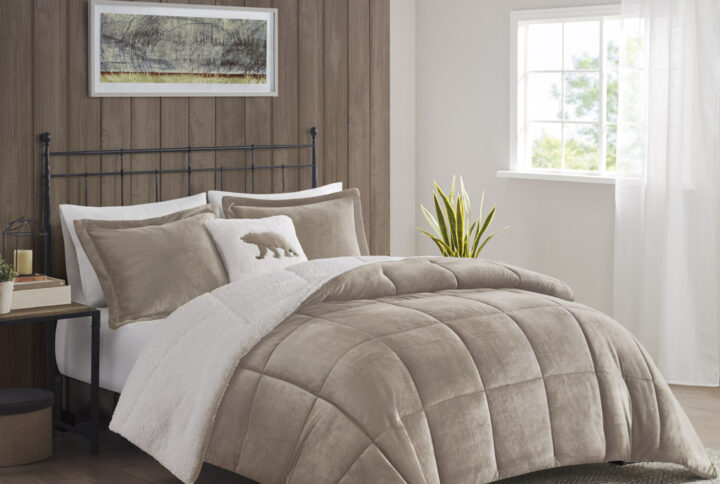 Bring the warmth and comfort of a cabin retreat to your bedroom with the Woolrich Alton Plush to Sherpa Down Alternative Comforter Set. Made from ultra-soft plush and reversing to a cozy berber