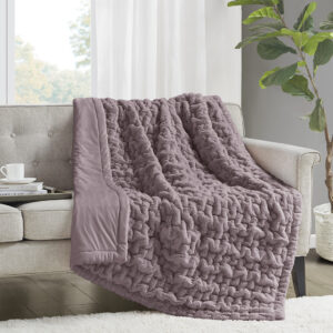 Add a modern and sophisticated touch to any space with the Madison Park Ruched Fur Throw. This throw features a solid ruched fur pattern