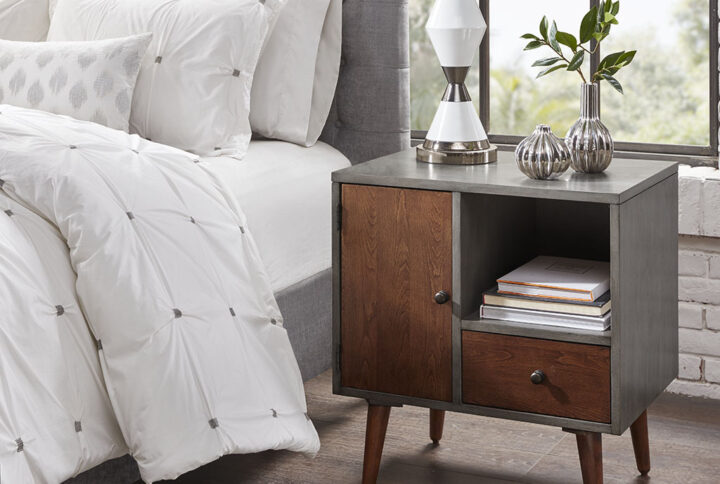 Add a mid-century modern flair to your home with the INK+IVY Stinson Storage Nightstand. Providing extra storage