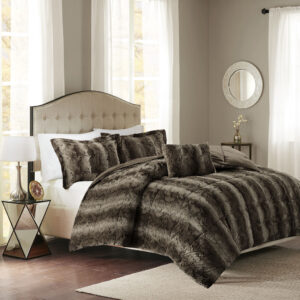 Snuggle up for a luxurious sleep with the Madison Park Zuri Comforter Set. This set features an ultra-soft faux fur front