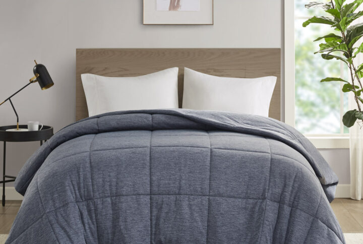 Dive into this cool and comfortable jersey knit down alternative comforter. Made from 50% nylon and 50% polyester