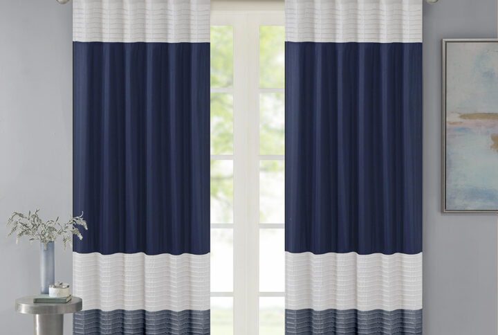 Madison Park Amherst Polyoni Pintuck Window Curtain is a simple way to add style to your room. This window panel features a modern striped design in deep hues of navy