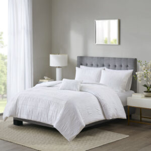 The Madison Park Nicolette 4 Piece Duvet Cover Set turns your bedroom into a cozy getaway. This seersucker duvet cover showcases a simple