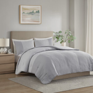 Refresh your bedroom with the subtle beauty of the Beautyrest Miro gauze comforter set. This lightweight comforter features a gray two-tone pieced design that embraces a more casual look with a touch of elegance. Matching shams repeat the modest style of the comforter to complete the oversized bedding set and give your room a chic neutral update that mixes well with a variety of styles.