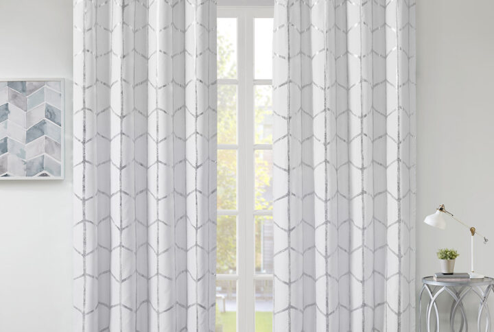 Freshen up your space with the enchanting style of Intelligent Design Raina Window Panel. The stunning panel flaunts a geometric