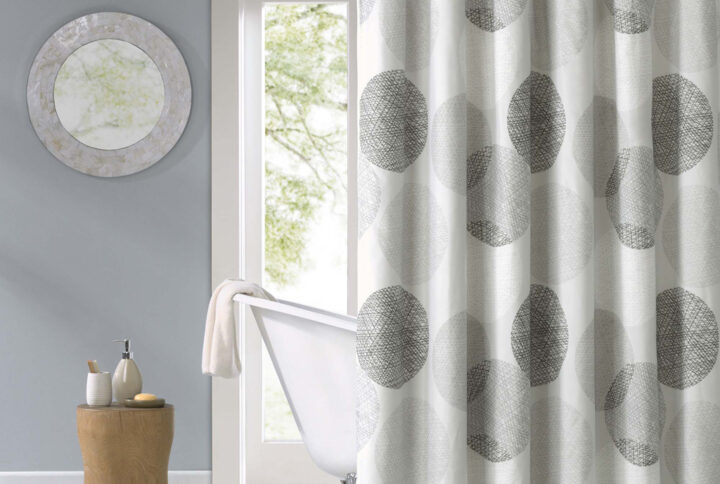 Knowles instantly updates your bathroom for a clean modern look. A circular print in different shades of gray covers this soft gray light weight shower curtain. Each shower curtain measure 72"x72" and is finished with 12 button holes at the top making it easy to hang; hooks