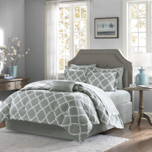 The Madison Park Essentials Merritt Reversible Complete Comforter and Cotton Sheet Set adds a simple yet chic look to your space. The comforter features a fretwork design against a vivid base that flips the color scheme on the reverse