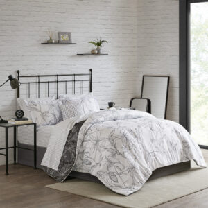 The Madison Park Essentials Lilia Reversible Complete Bedding Set with Cotton Sheet Set offers a modern update to your bedroom. The reversible comforter and shams (1 in Twin sizes) feature a botanic print in charcoal grey on a white base that flips the color scheme on the reverse. A solid grey bedskirt and a square decorative pillow with embroidered details add the perfect finishing touches. Also included is a striped 100% cotton sheet set that coordinates with the comforter set. Bringing the best in health and wellness