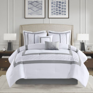 510 Design presents the Powell 8 Piece Embroidered Comforter Set to elevate your bedroom decor. This hotel style white comforter features an embroidered and pieced border for a sophisticated and elegant design that easily coordinates with your space. The matching pillow shams also flaunt beautiful embroidery details