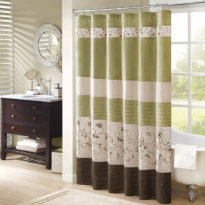 Add an elegant addition to your bathroom with the Madison Park Serene shower curtain. Its rich green and delicate embroidery are the perfect combination.  This 72x72" shower curtain is machine washable for easy care.Complete the look with coordinating bedding available and sold separately.