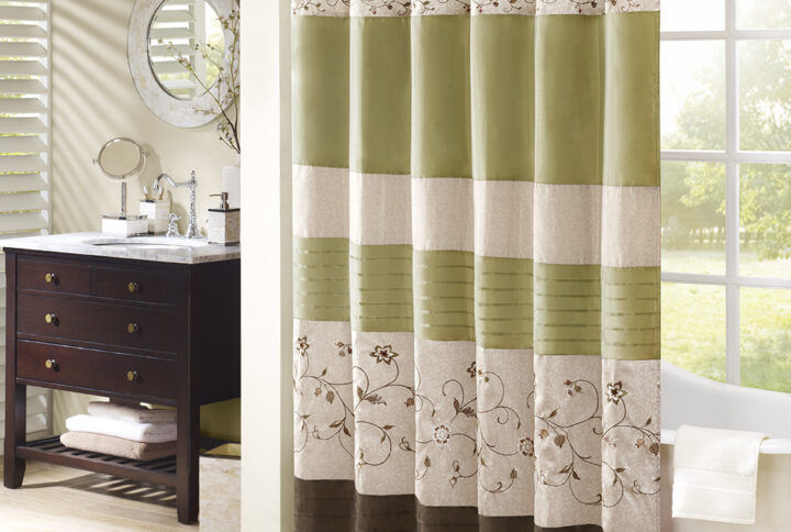 Add an elegant addition to your bathroom with the Madison Park Serene shower curtain. Its rich green and delicate embroidery are the perfect combination.  This 72x72" shower curtain is machine washable for easy care.Complete the look with coordinating bedding available and sold separately.