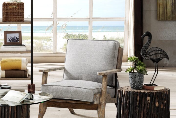 The INK+IVY Malibu Accent Chair offers a perfect blend of style and comfort for your living space. This accent chair features upholstered seat and back with a solid wood frame