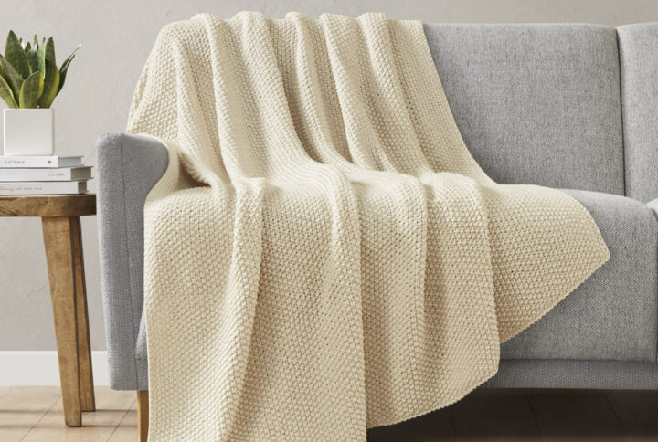 Bundle up in the warm and cozy comfort of the INK+IVY Bree Knit Throw. This ultra-soft